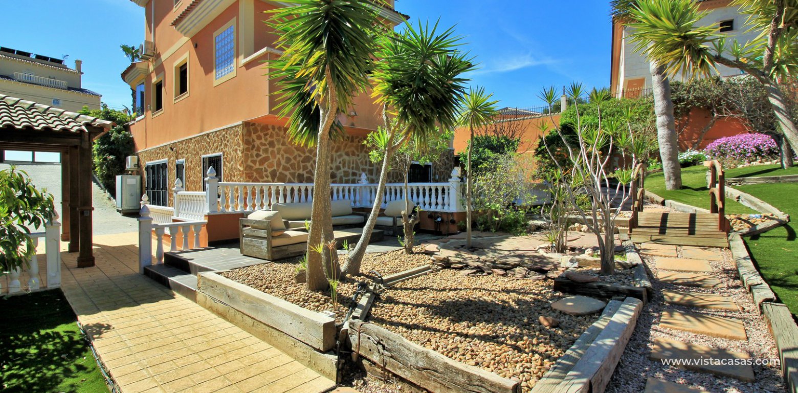 Modern 5 bedroom detached villa with private pool and large plot for sale Villamartin back garden 2