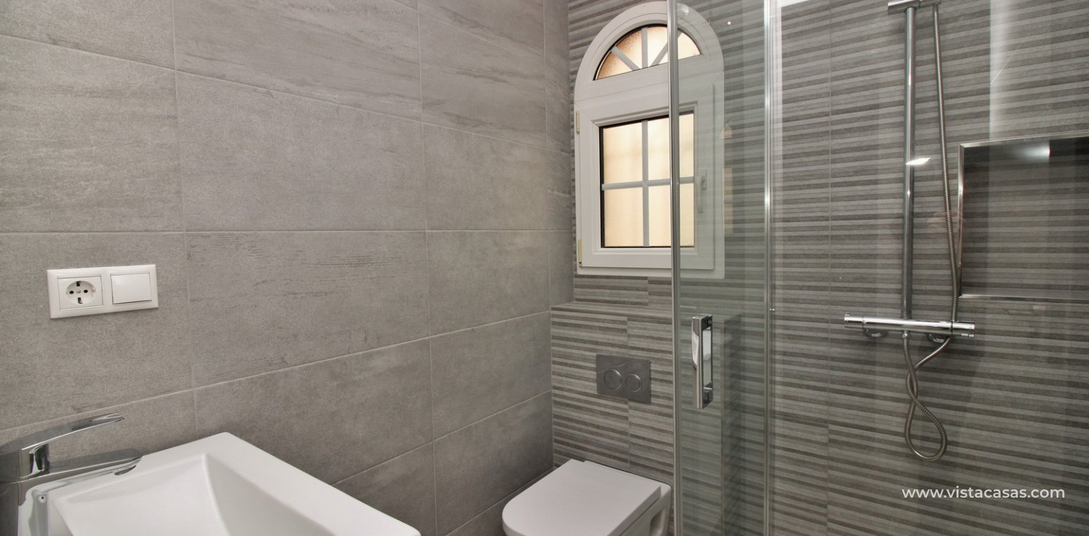 Villa with private pool for sale R3 Las Violetas Villamartin downstairs bathroom