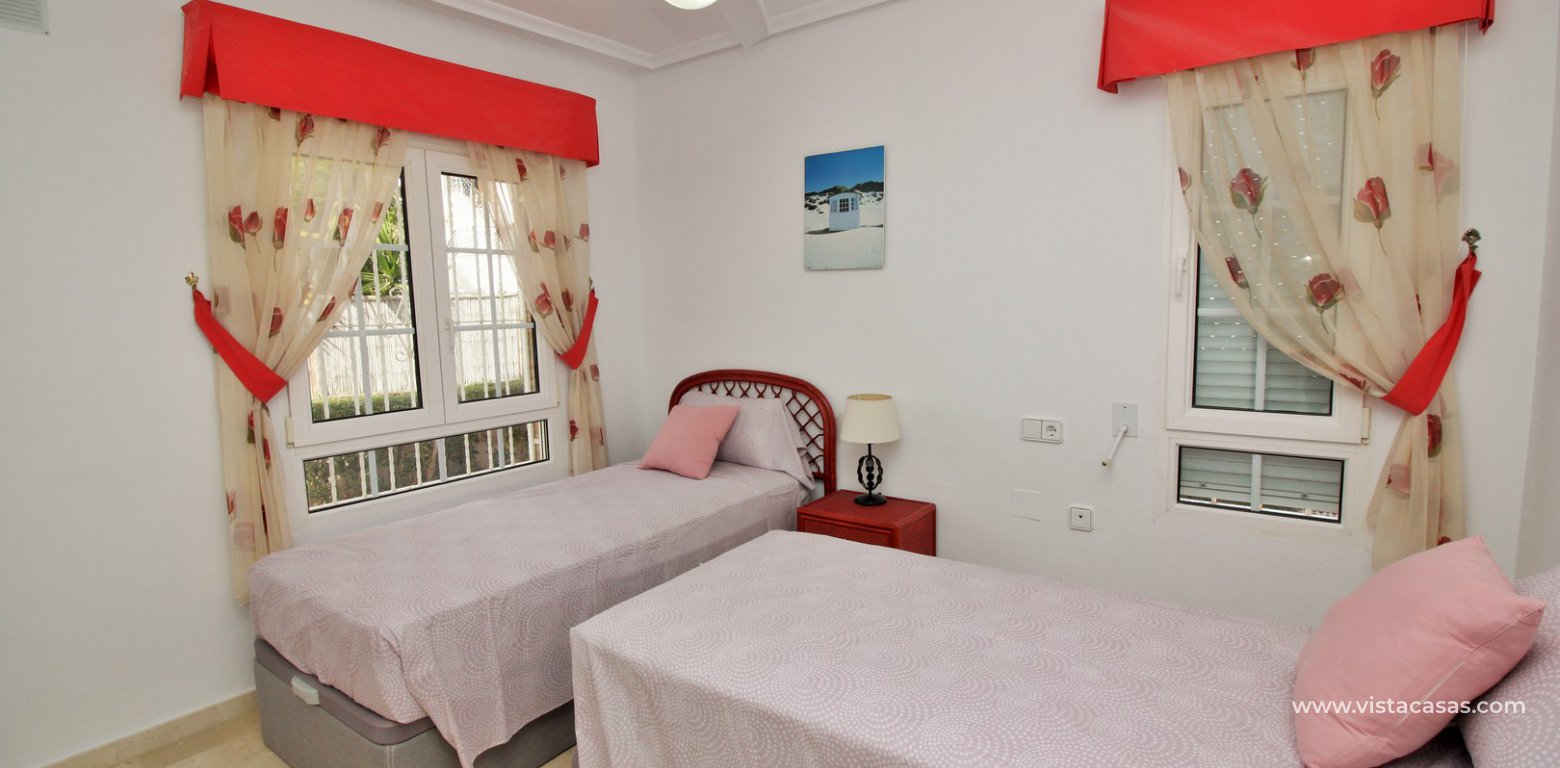 Villa with private pool for sale R3 Las Violetas Villamartin twin bedroom