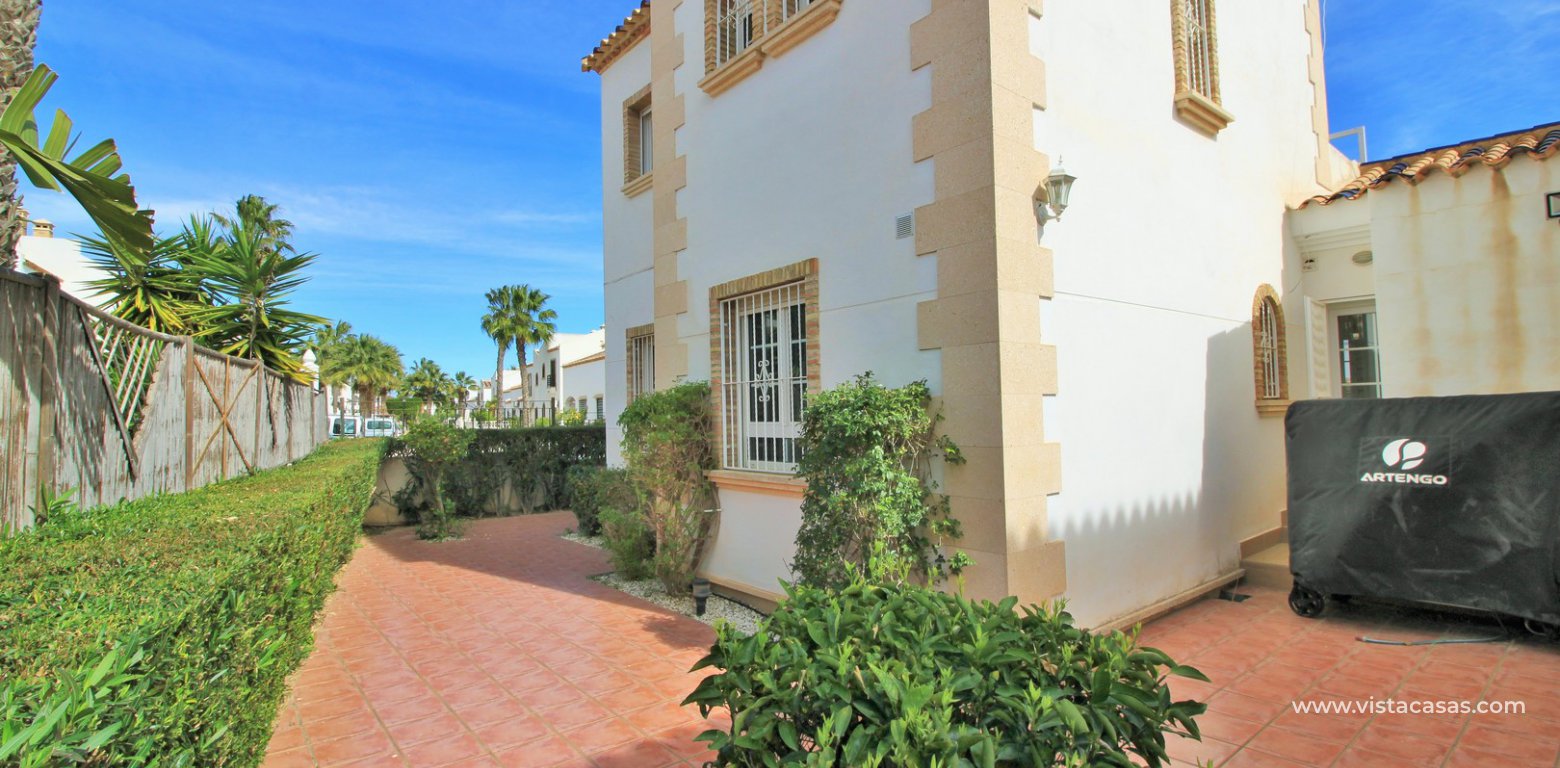 Villa with private pool for sale R3 Las Violetas Villamartin rear garden
