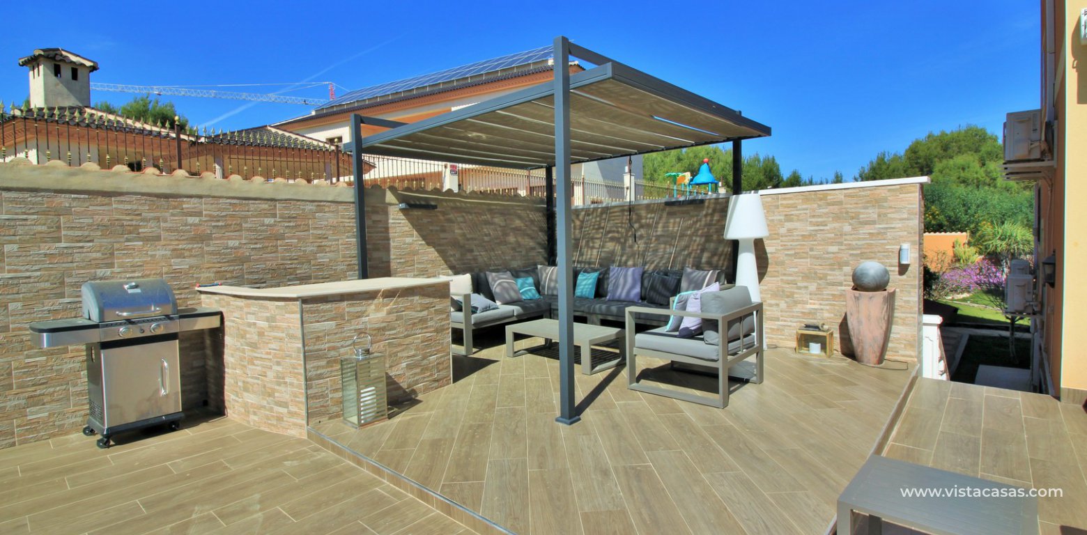 Modern 5 bedroom detached villa with private pool and large plot for sale Villamartin summer kitchen