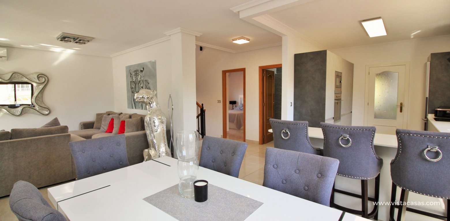 Modern 5 bedroom detached villa with private pool and large plot for sale Villamartin dining area