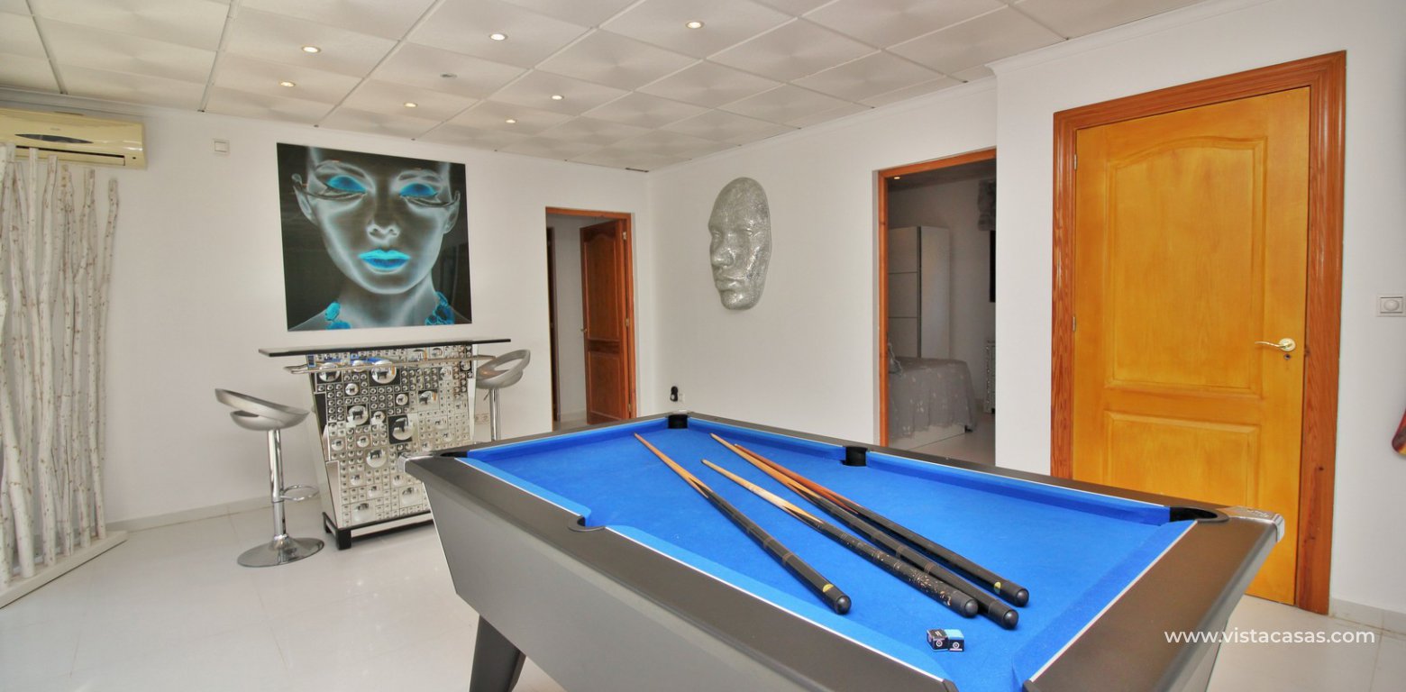 Modern 5 bedroom detached villa with private pool and large plot for sale Villamartin games pool area