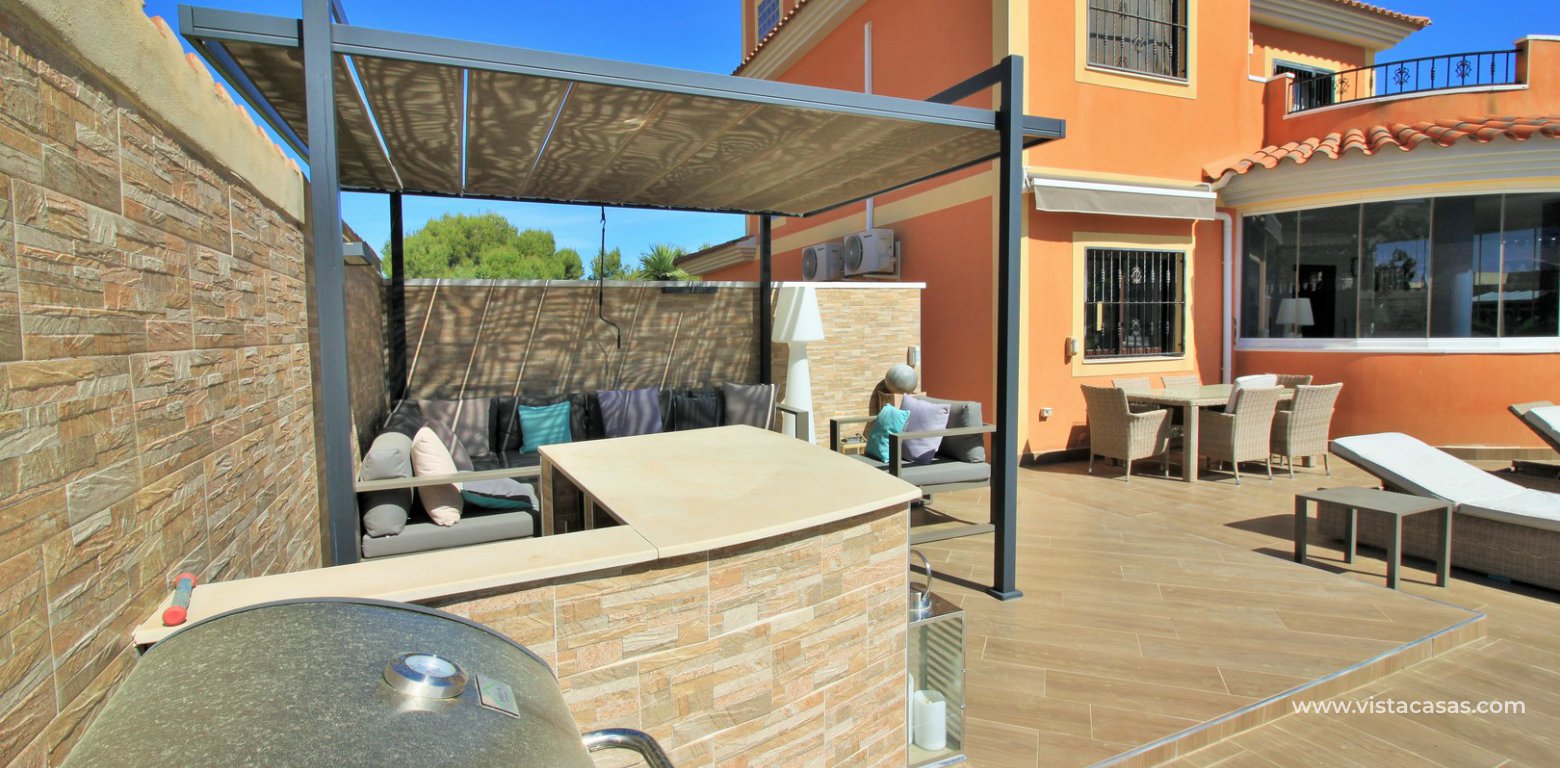 Modern 5 bedroom detached villa with private pool and large plot for sale Villamartin bbq area