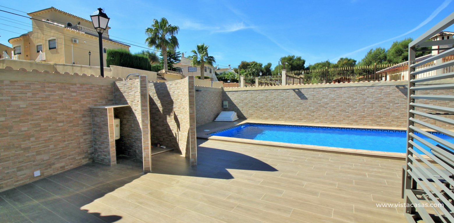 Modern 5 bedroom detached villa with private pool and large plot for sale Villamartin pool shower area