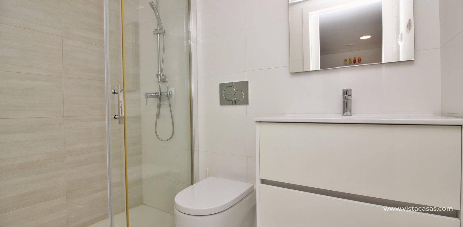 Townhouse for sale El Manantial Los Dolses downstairs bathroom