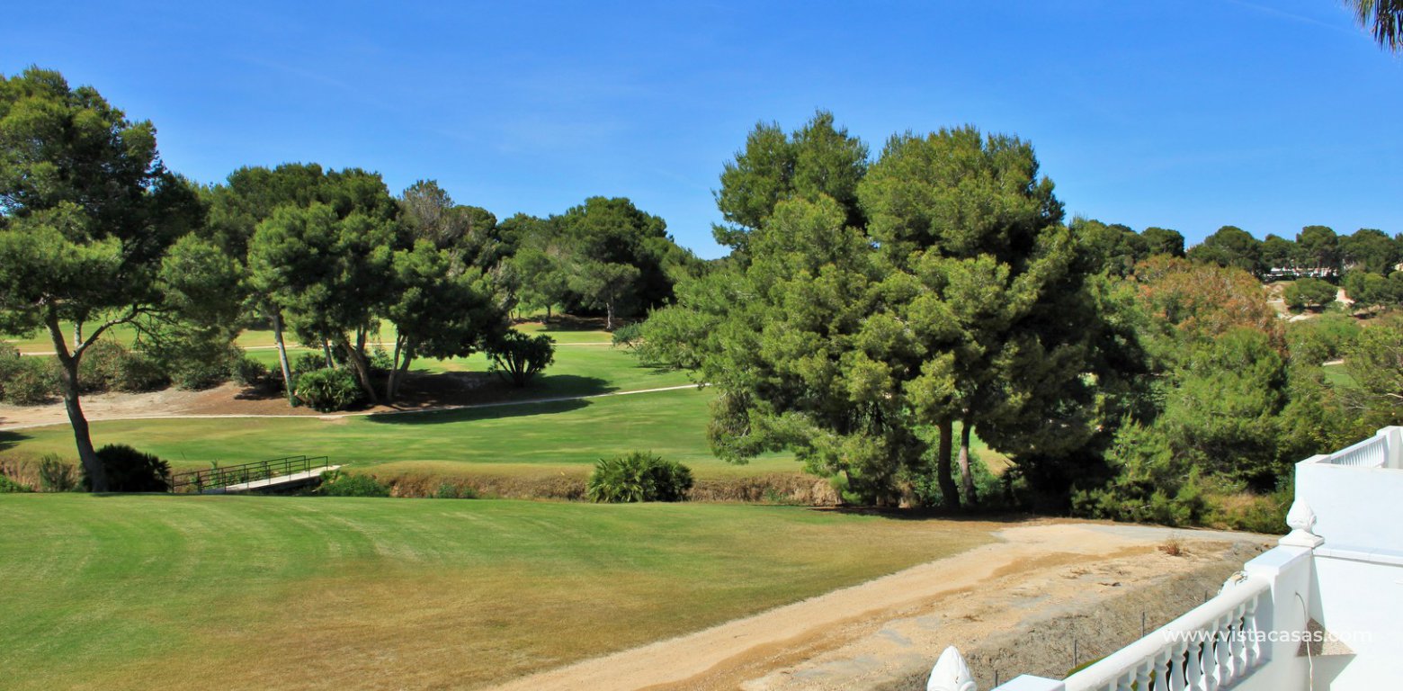 Detached villa for sale overlooking the golf course Fortuna II Villamartin balcony 2 views