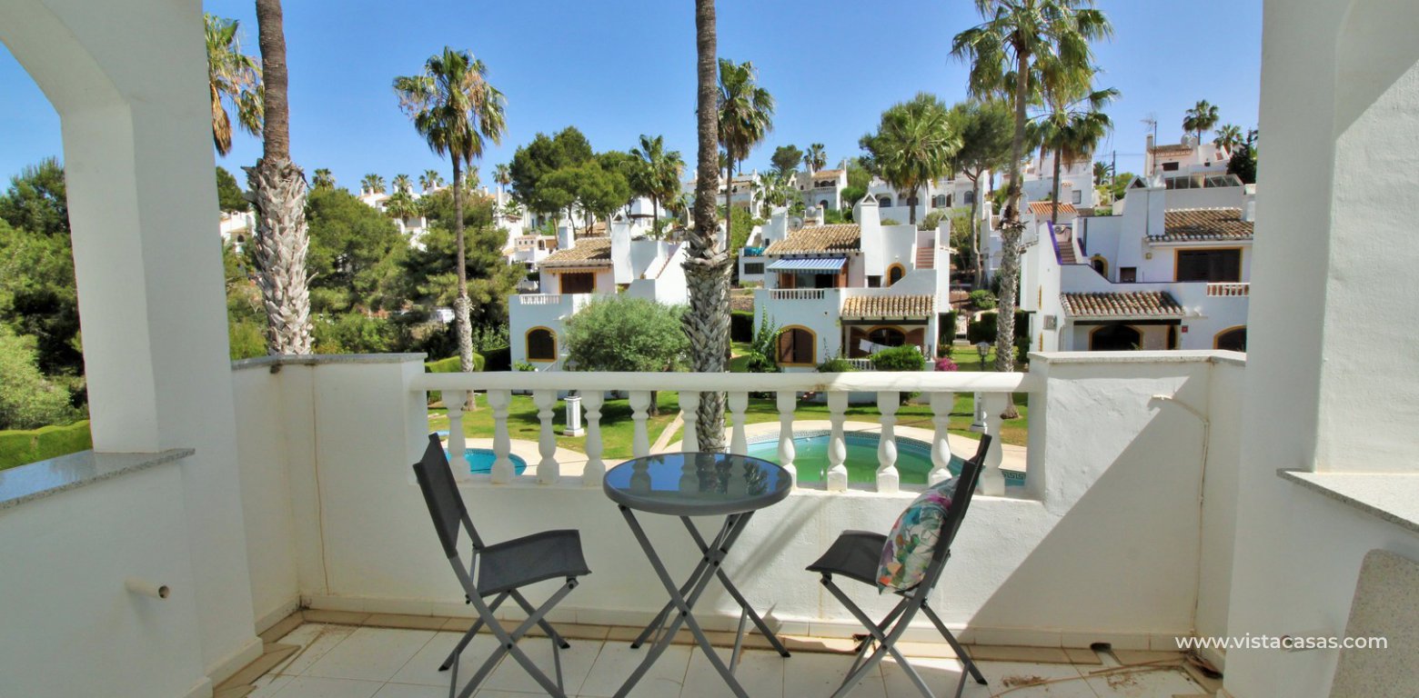 Detached villa for sale overlooking the golf course Fortuna II Villamartin front balcony