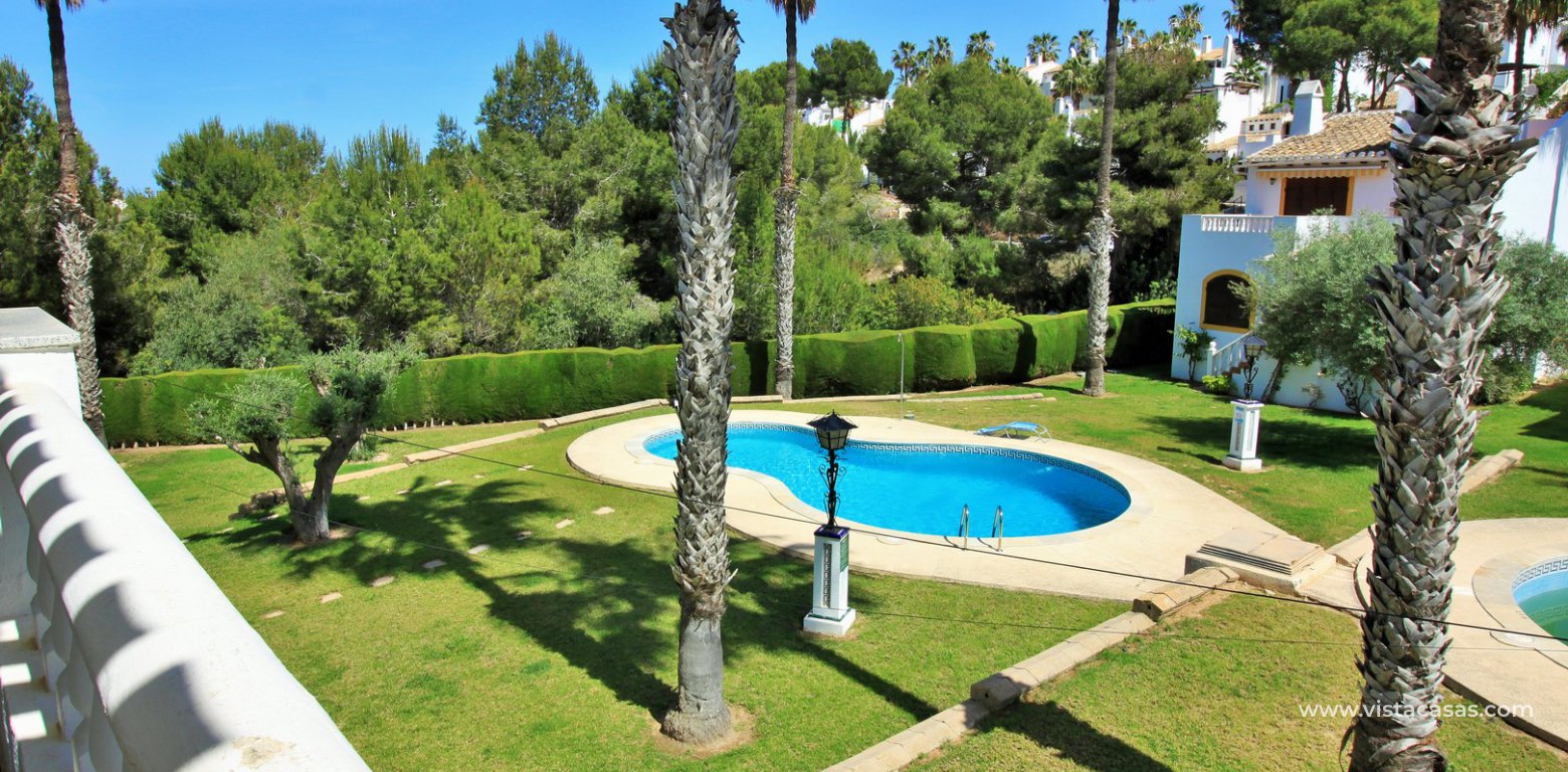 Detached villa for sale overlooking the golf course Fortuna II Villamartin balcony overlooking the pool