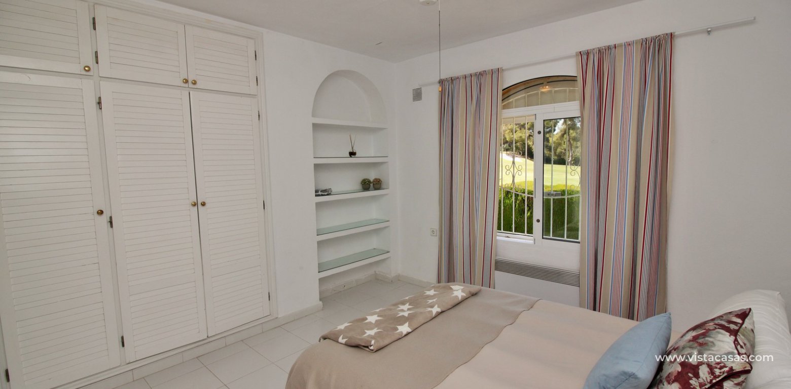 Detached villa for sale overlooking the golf course Fortuna II Villamartin master bedroom fitted wardrobes