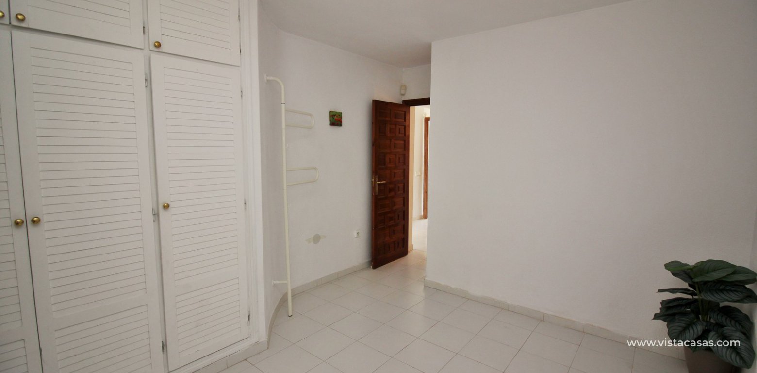 Detached villa for sale overlooking the golf course Fortuna II Villamartin front double bedroom fitted wardrobes