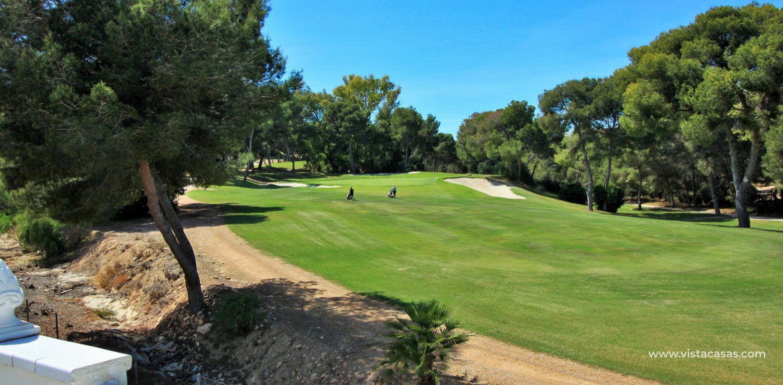Detached villa for sale overlooking the golf course Fortuna II Villamartin roof terrace golf view