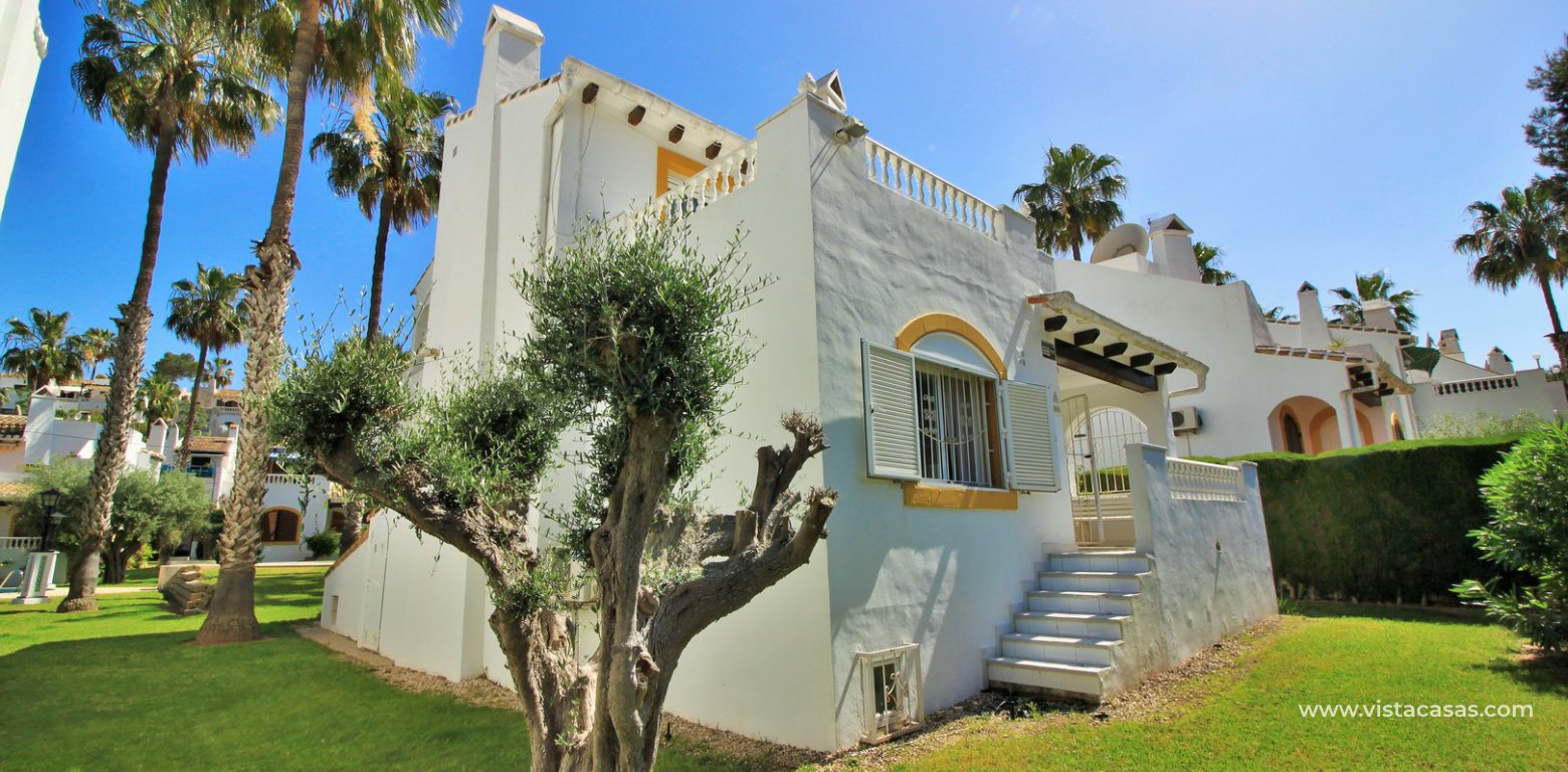 Detached villa for sale overlooking the golf course Fortuna II Villamartin rear exterior