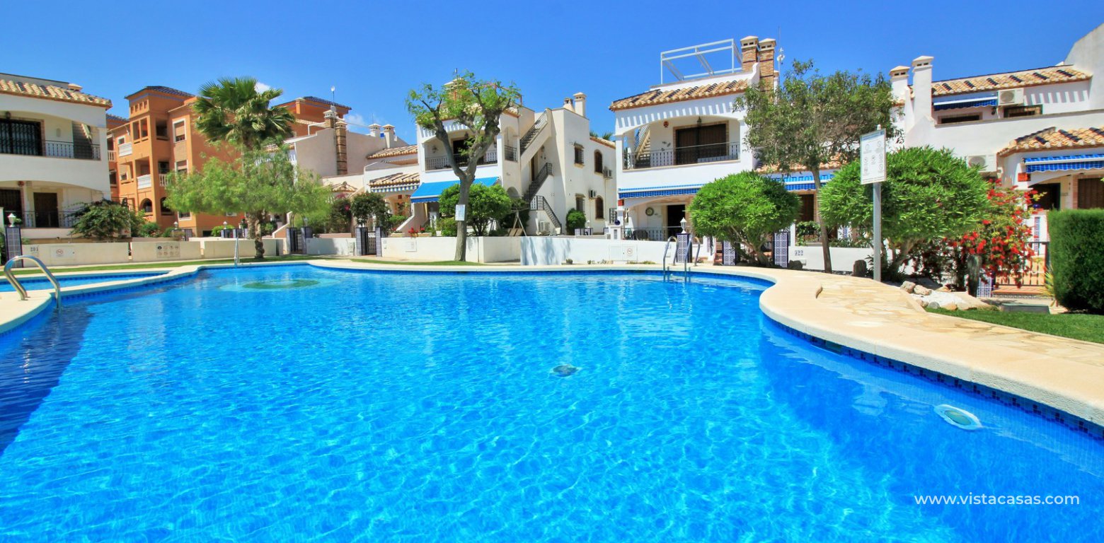 South facing top floor apartment for sale M7 Pau 8 Villamartin communal swimming pool