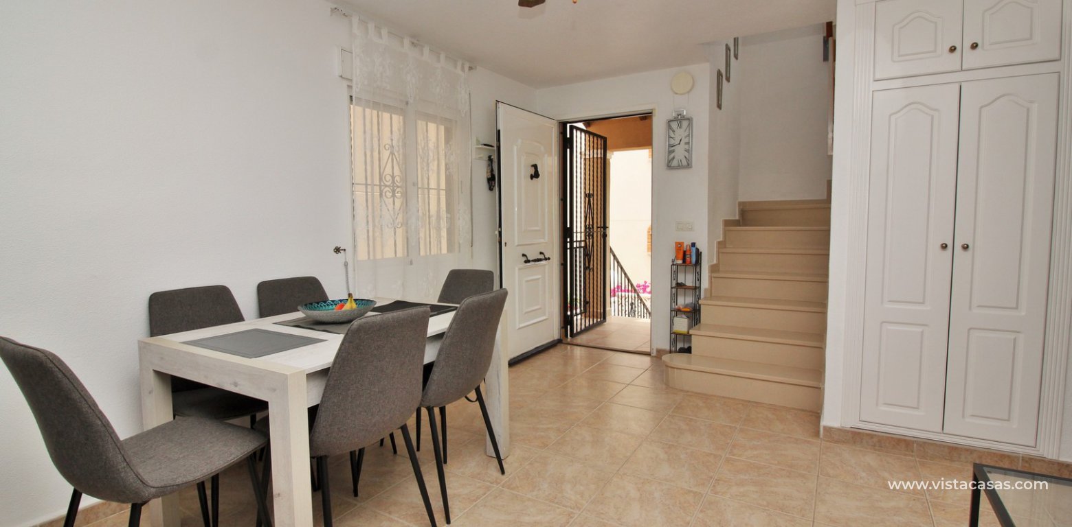 Detached 3 bedroom villa overlooking the pool for sale Torregolf I Villamartin dining area