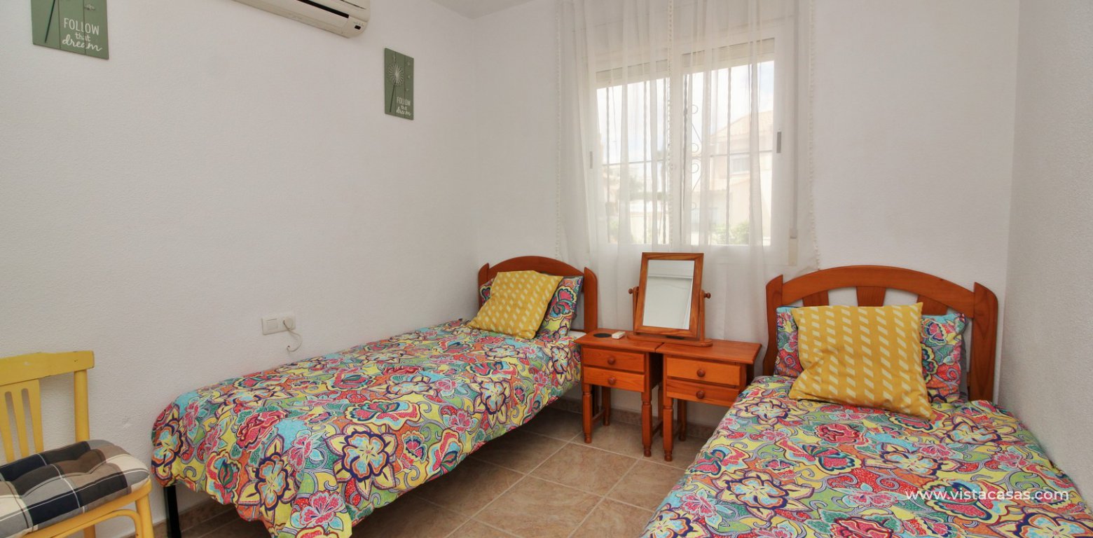 Detached 3 bedroom villa overlooking the pool for sale Torregolf I Villamartin twin bedroom