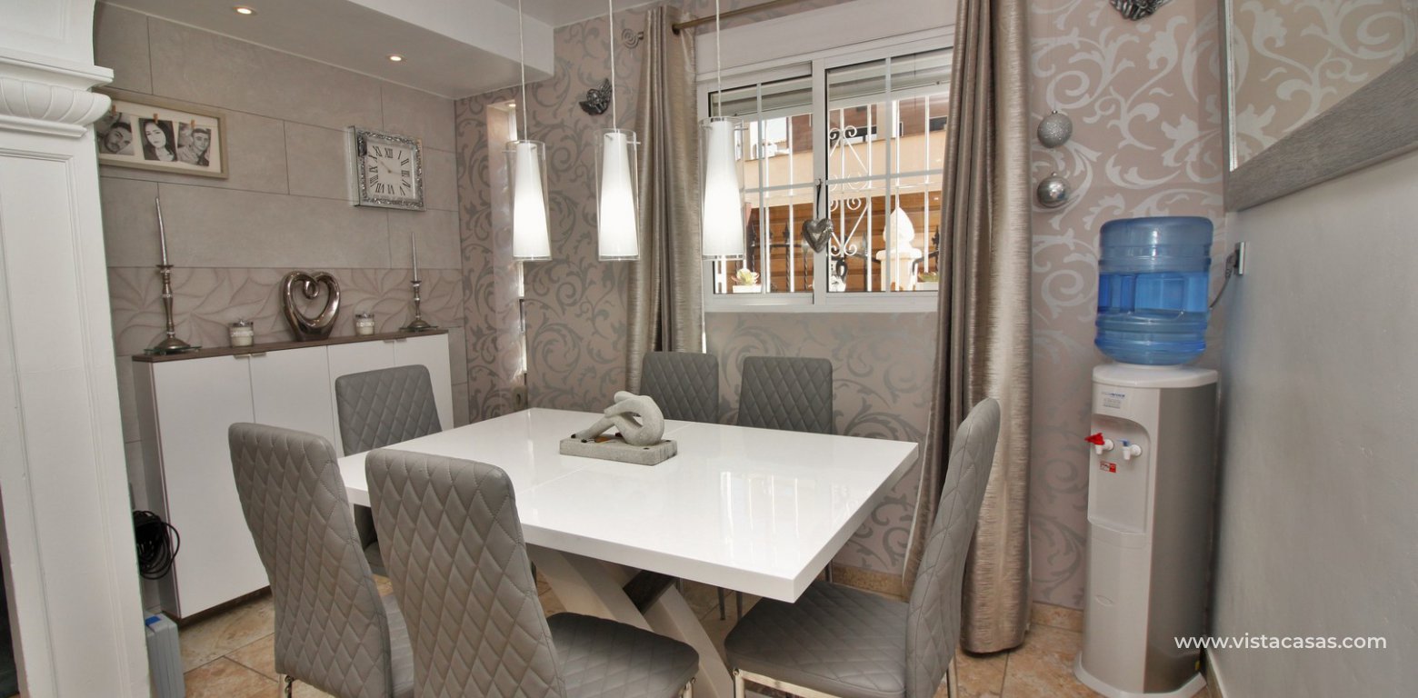 South facing villa with private pool and underbuild for sale Villamartin dining area