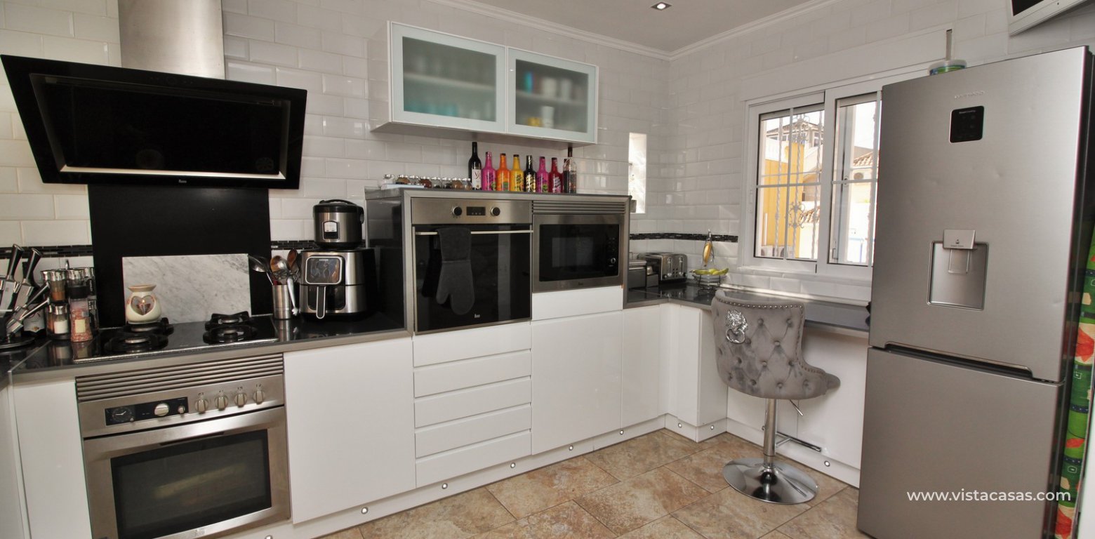 South facing villa with private pool and underbuild for sale Villamartin kitchen