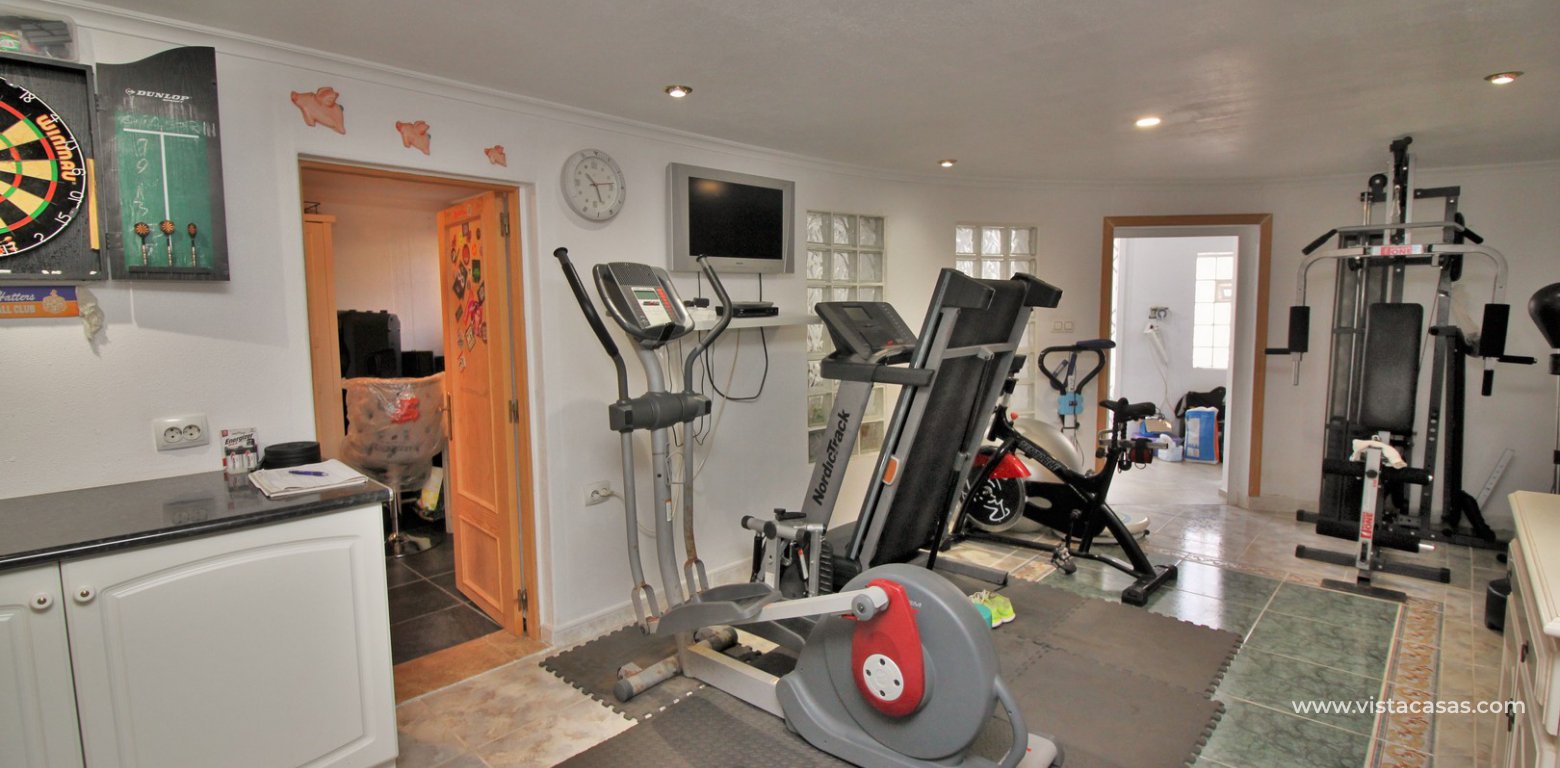 South facing villa with private pool and underbuild for sale Villamartin annex lounge gym