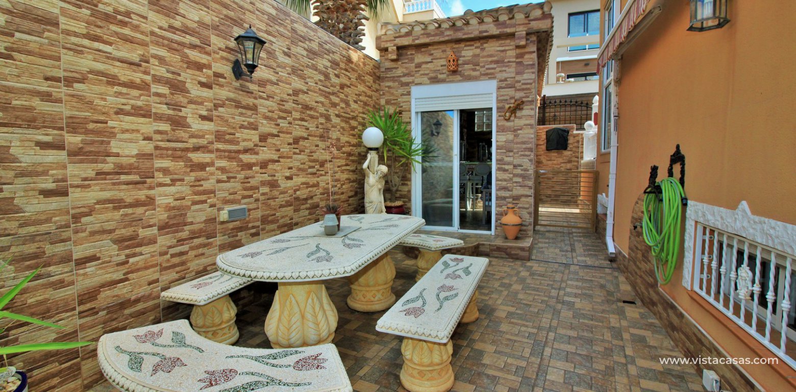 South facing villa with private pool and underbuild for sale Villamartin outside seating area