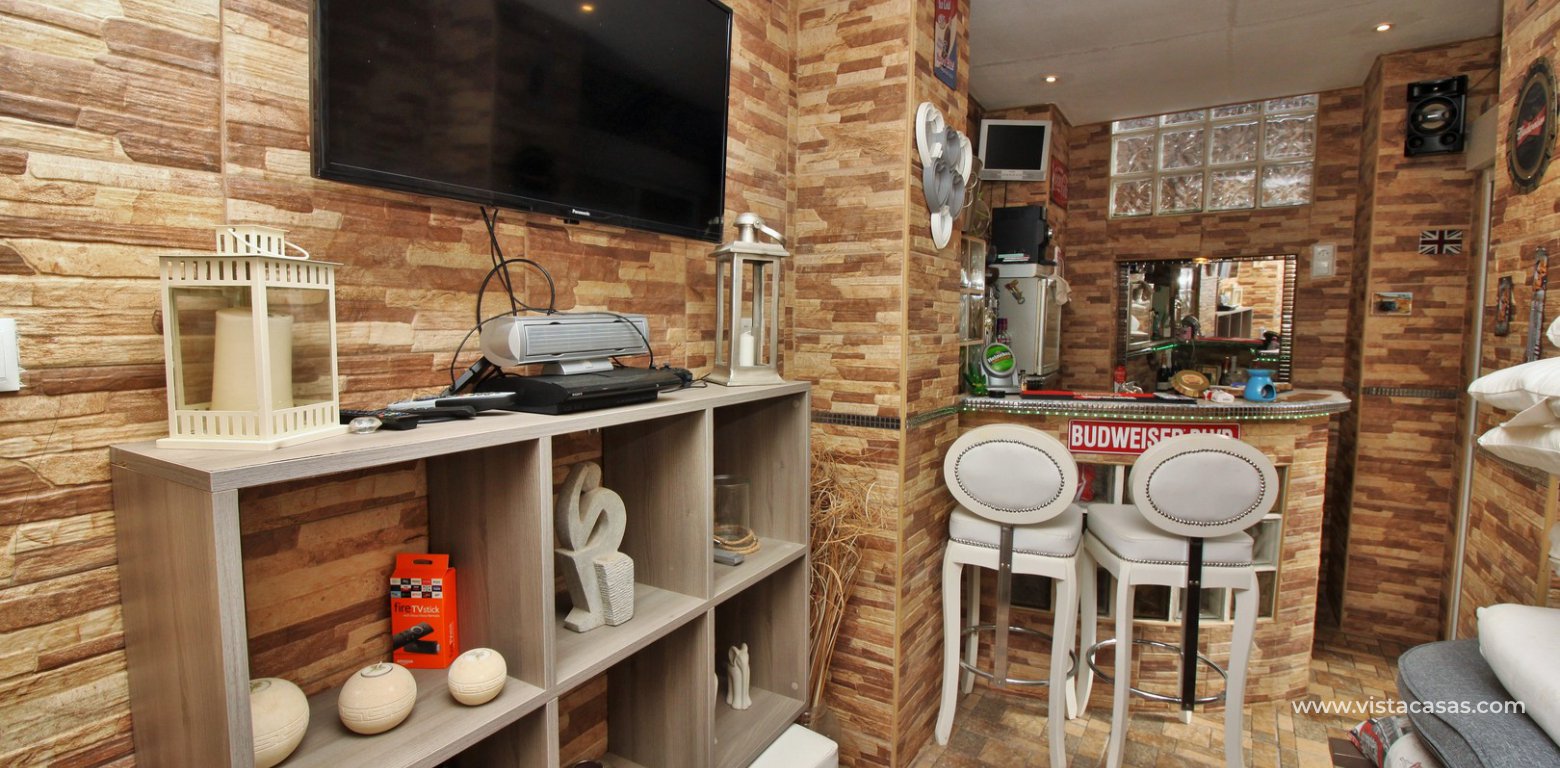 South facing villa with private pool and underbuild for sale Villamartin outside kitchen bar