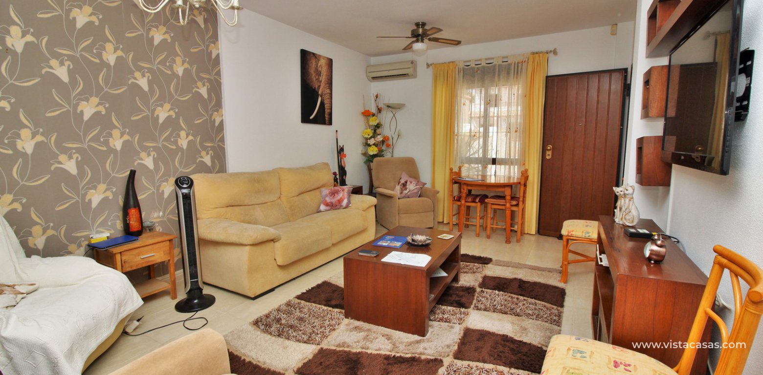 3 bedroom villa for sale overlooking the pool El Palmeral Pau 8 Villamartin lounge 2