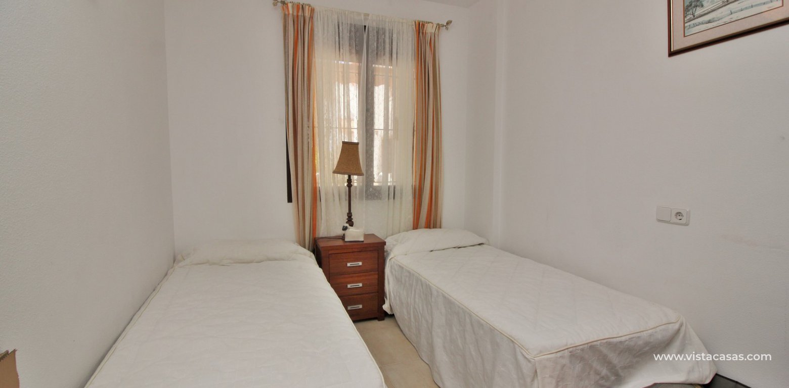 3 bedroom villa for sale overlooking the pool El Palmeral Pau 8 Villamartin downstairs twin bedroom