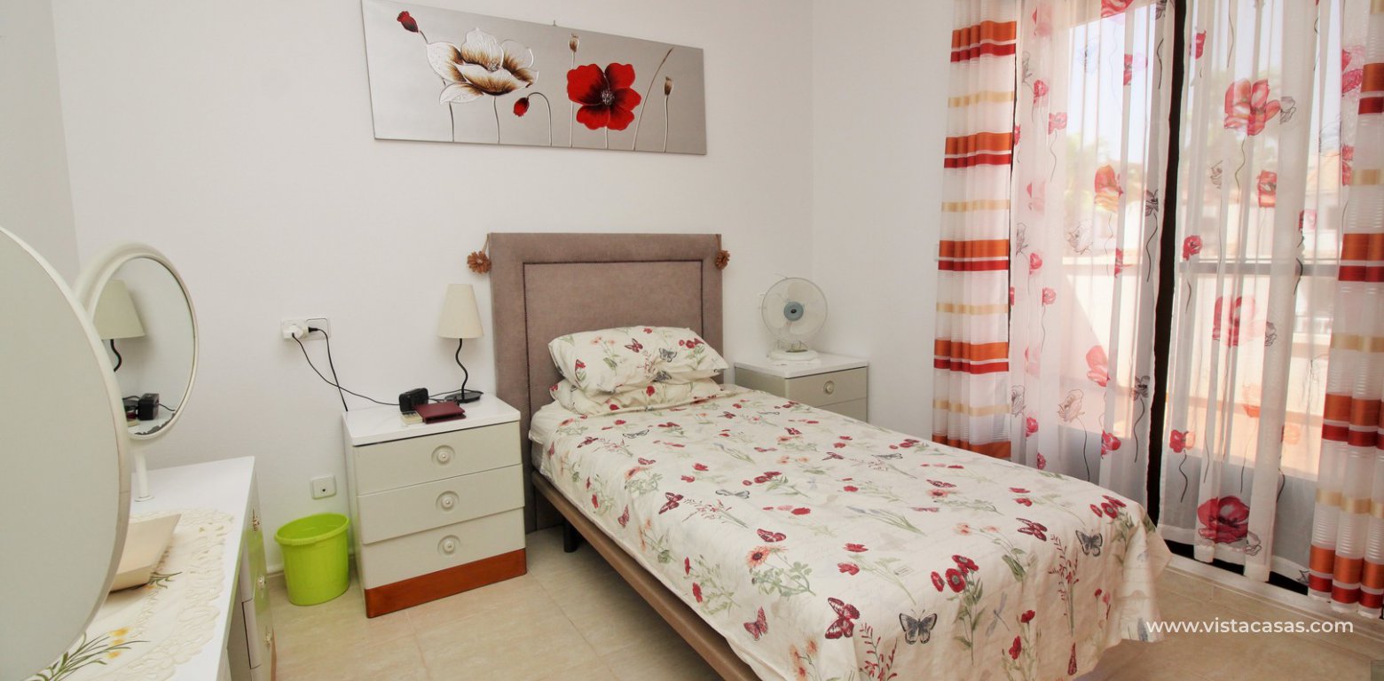 3 bedroom villa for sale overlooking the pool El Palmeral Pau 8 Villamartin master bedroom