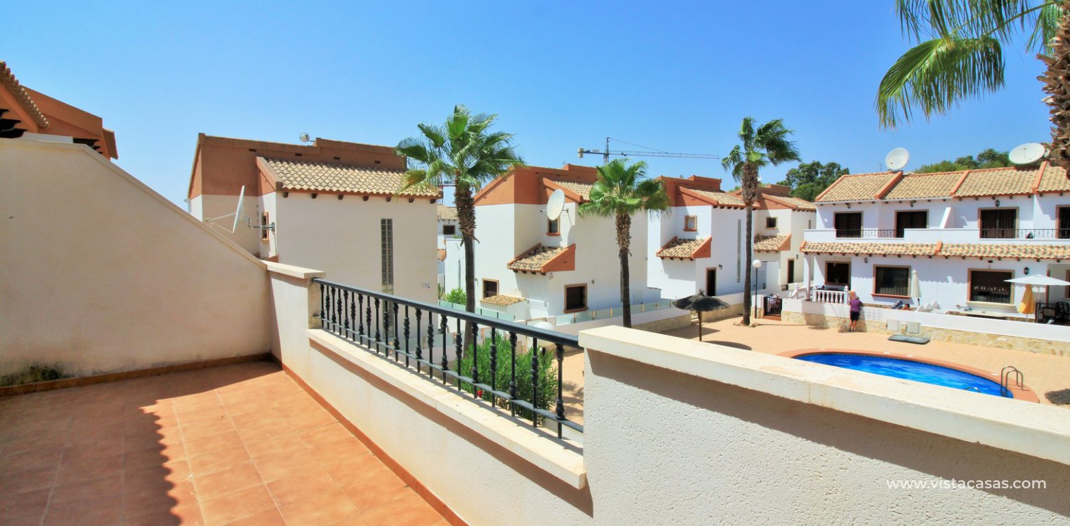 3 bedroom villa for sale overlooking the pool El Palmeral Pau 8 Villamartin balcony