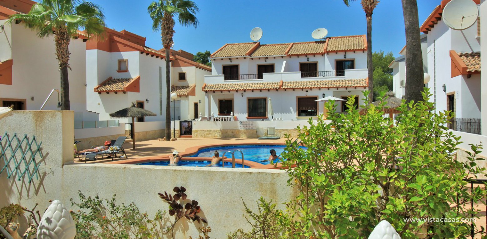 3 bedroom villa for sale overlooking the pool El Palmeral Pau 8 Villamartin garden pool view