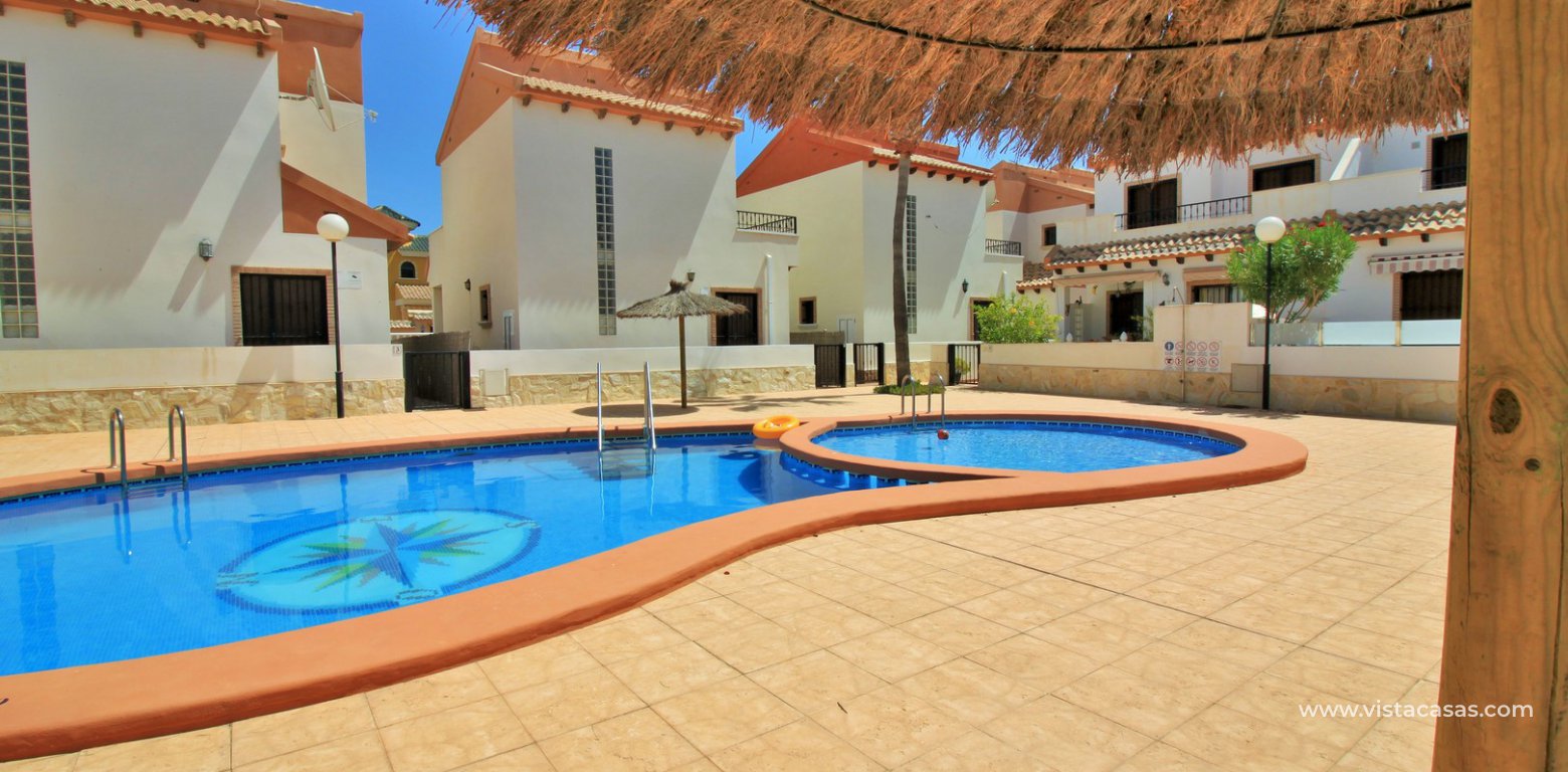 3 bedroom villa for sale overlooking the pool El Palmeral Pau 8 Villamartin communal pool