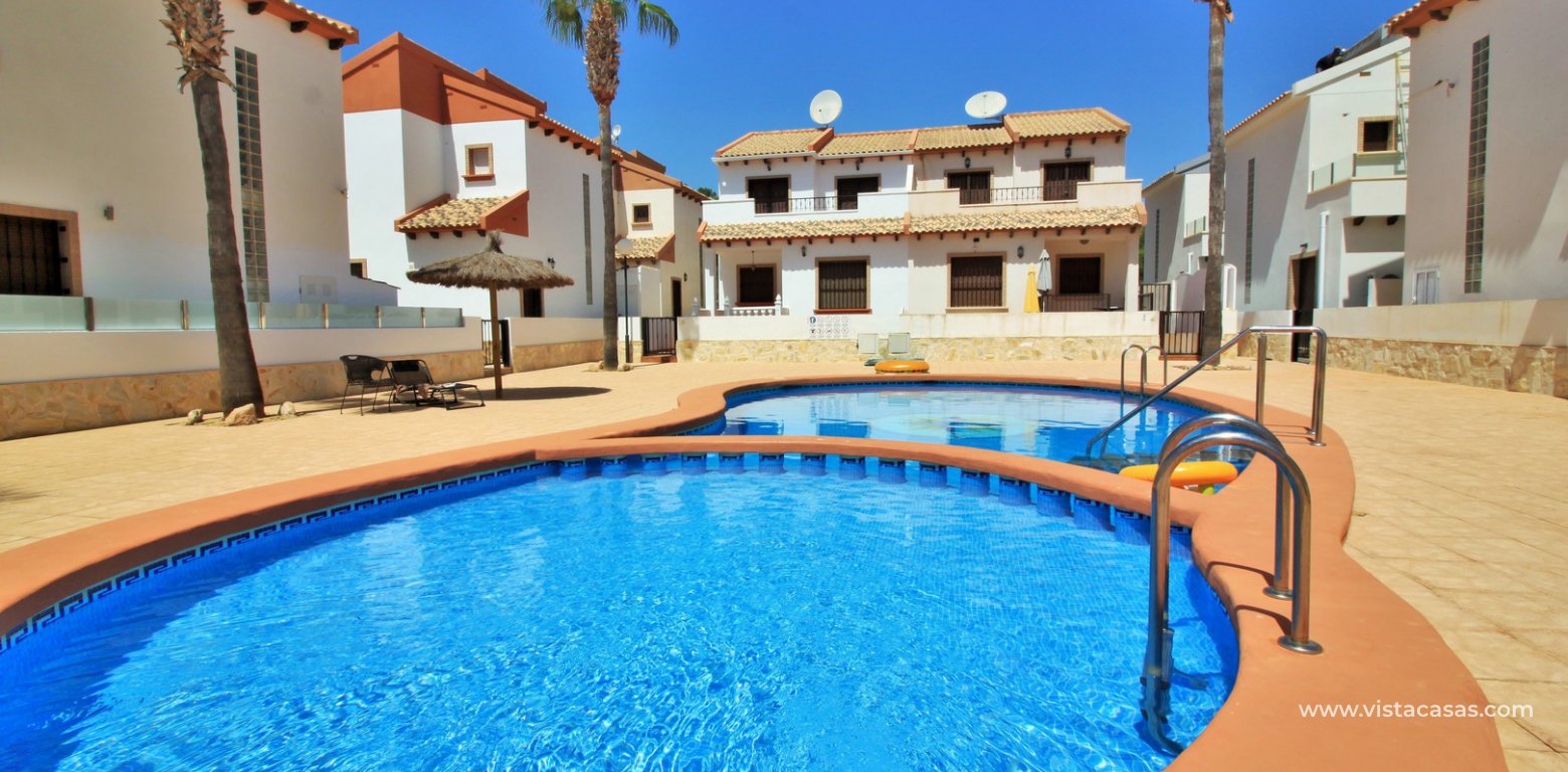 3 bedroom villa for sale overlooking the pool El Palmeral Pau 8 Villamartin swimming pool