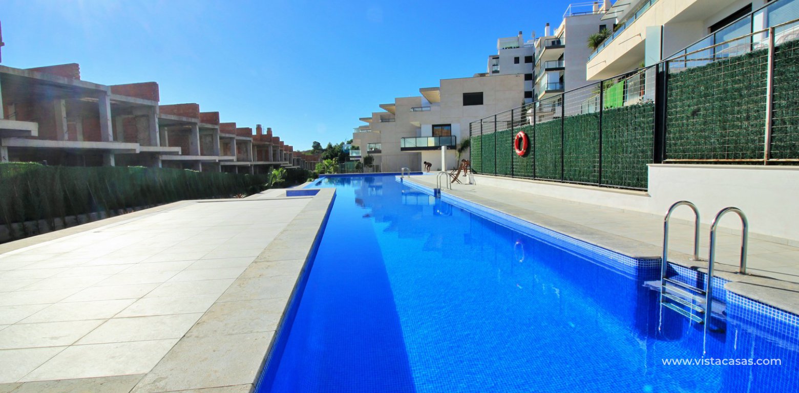 Apartment for sale in Campoamor Golf swimming pool