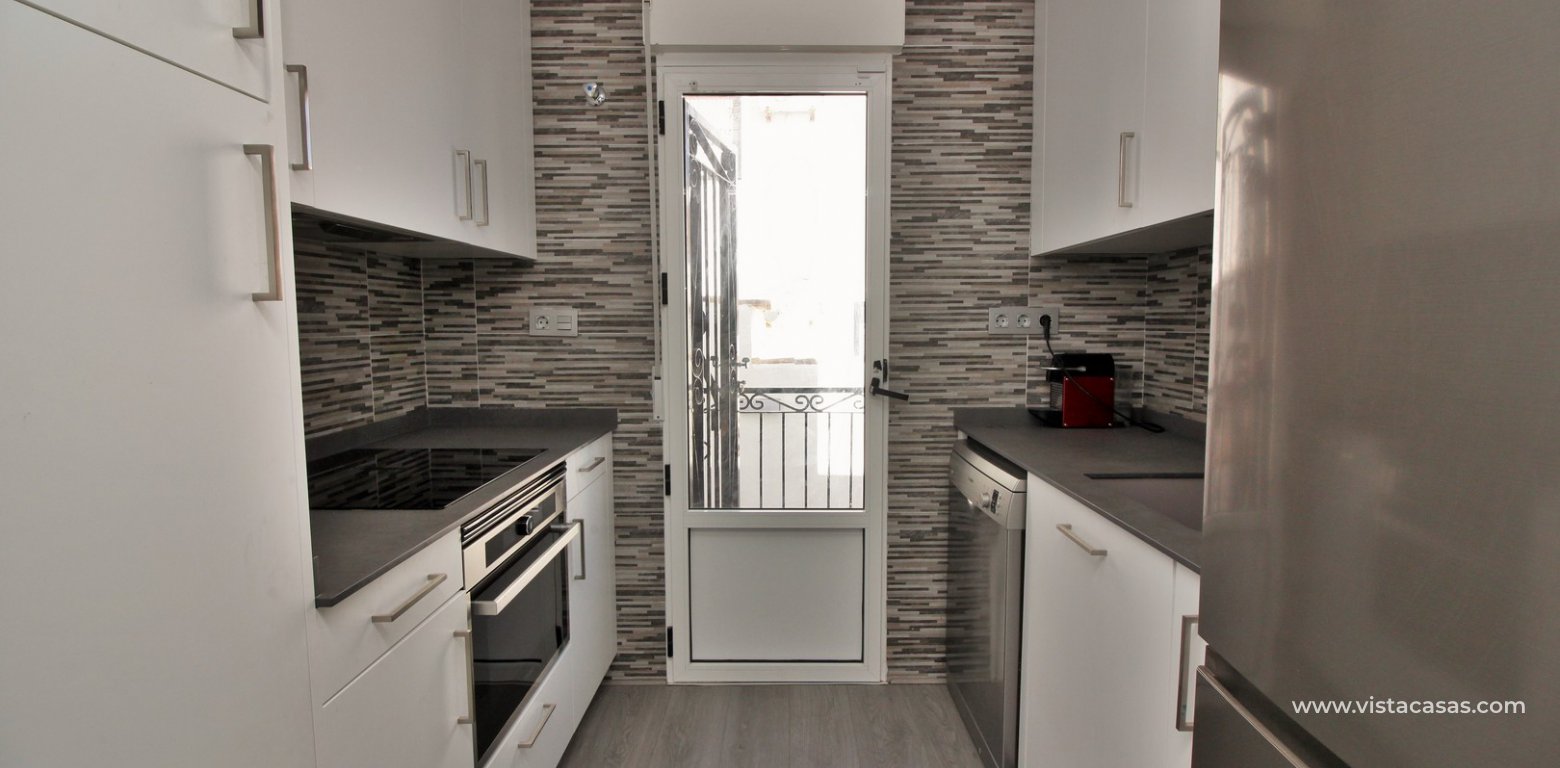 Quad house private pool for sale Lago Sol Los Altos renovated kitchen