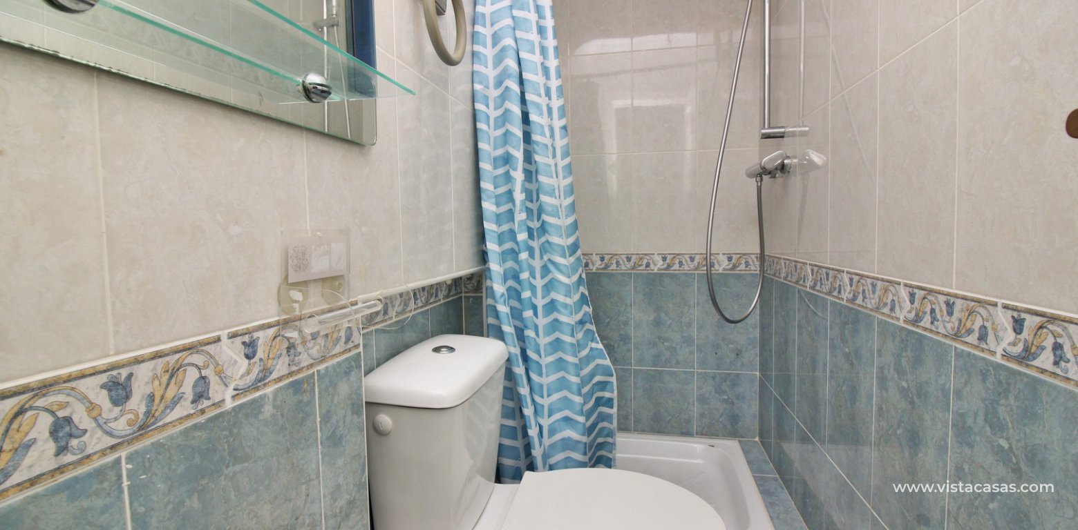 Quad house private pool for sale Lago Sol Los Altos downstairs bathroom