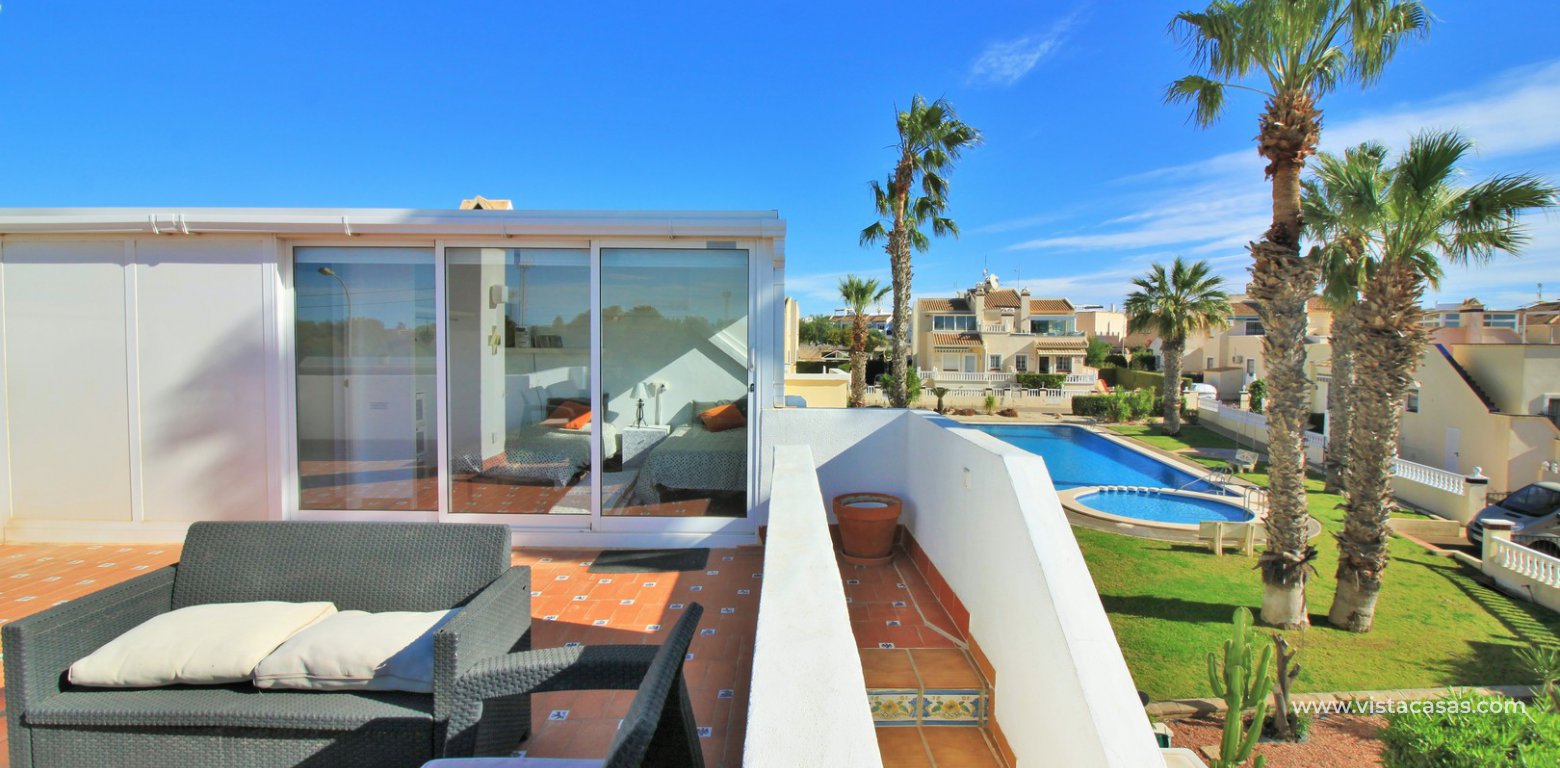 South facing Jumilla bungalow for sale Playa Flamenca solarium pool view