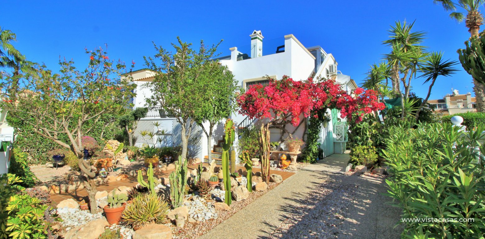 South facing Jumilla bungalow for sale Playa Flamenca driveway