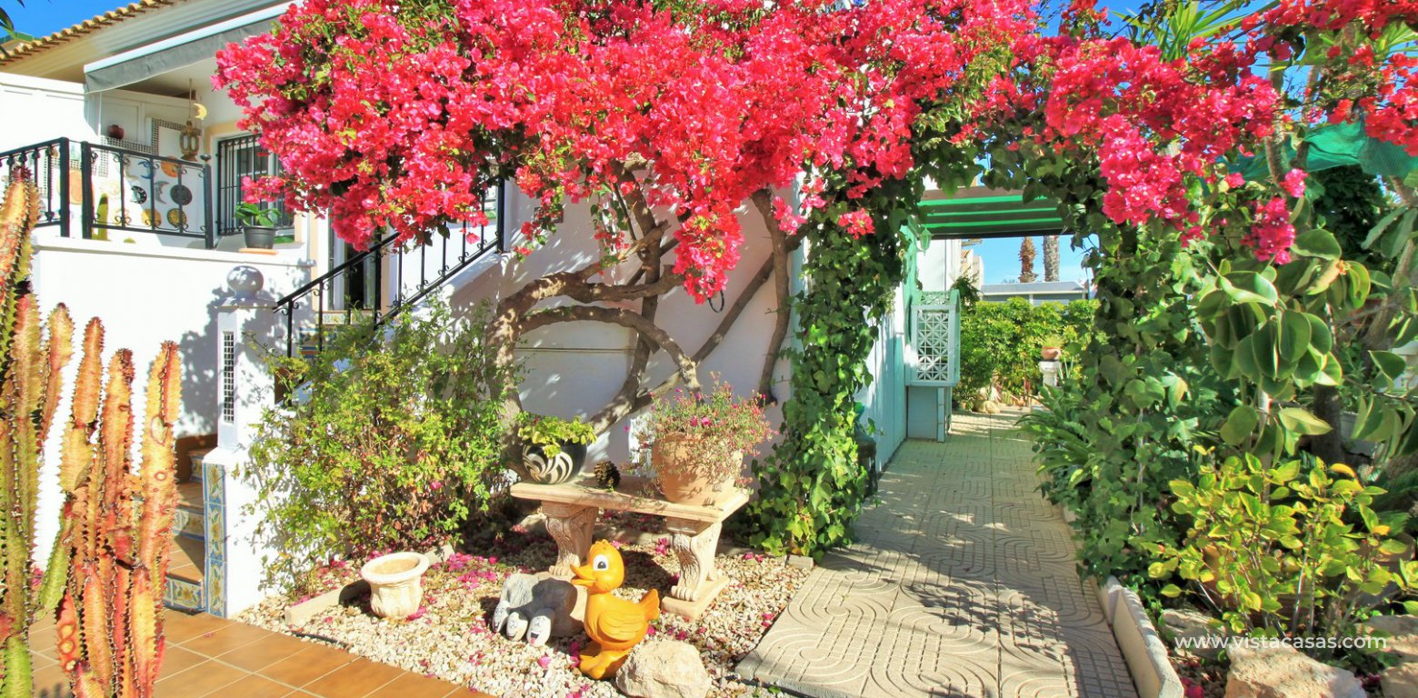 South facing Jumilla bungalow for sale Playa Flamenca mature gardens