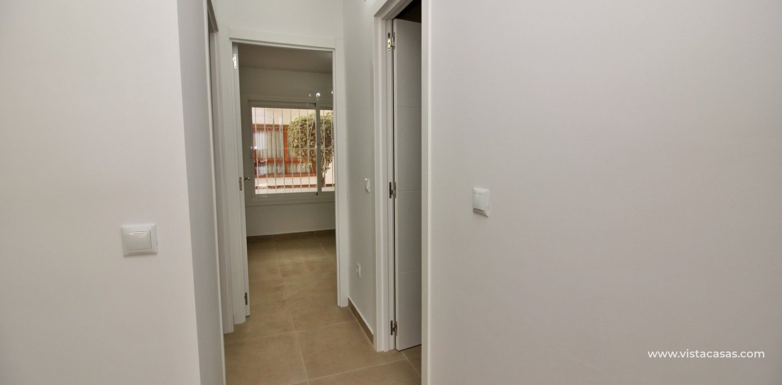 Modern South facing ground floor apartment for sale in Los Dolses hallway