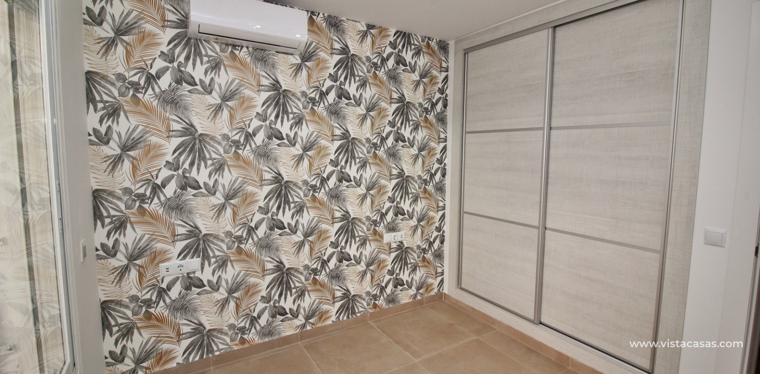 Modern South facing ground floor apartment for sale in Los Dolses double bedroom fitted wardrobes