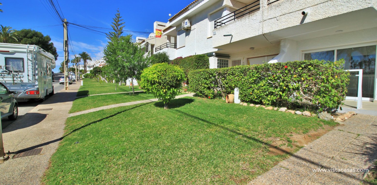 Modern South facing ground floor apartment for sale in Los Dolses front communal gardens