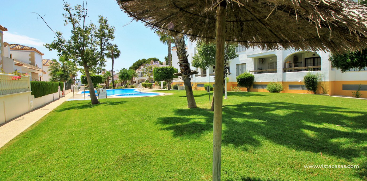 Apartment with pool view for sale Las Violetas Villamartin communal gardens