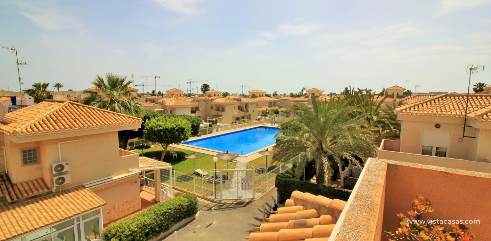 South facing townhouse for sale Playa Flamenca overlooking the pool