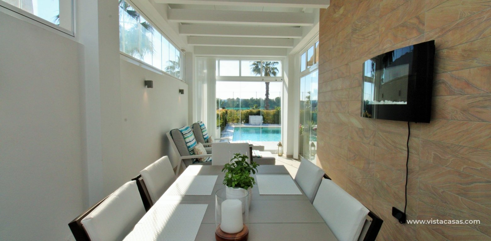 Modern detached villa for sale La Finca Golf Algorfa dining area summer