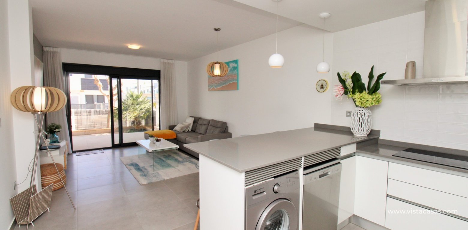 Ground floor apartment for sale in Lamar Resort II Pilar de la Horadada open plan kitchen lounge