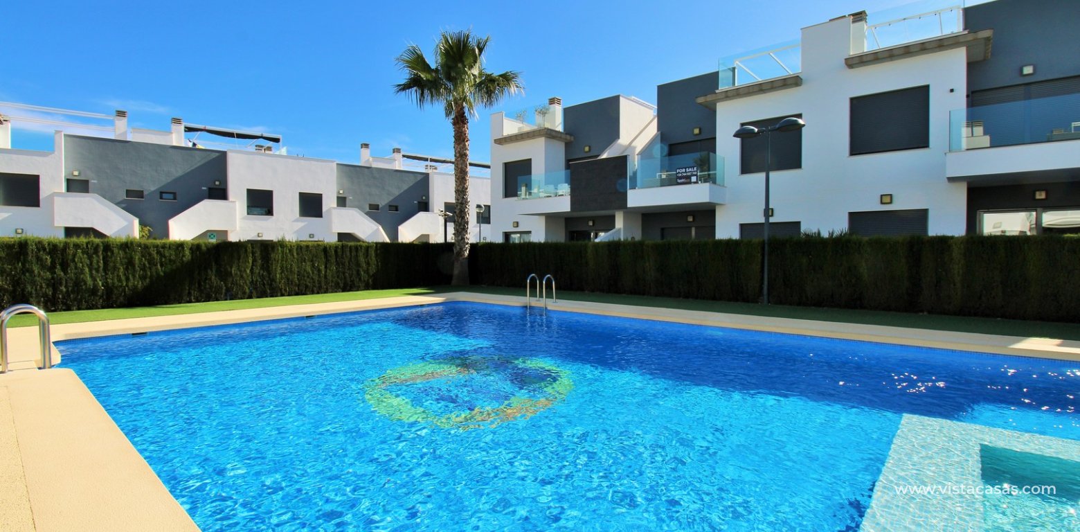 Ground floor apartment for sale in Lamar Resort II Pilar de la Horadada communal swimming pool
