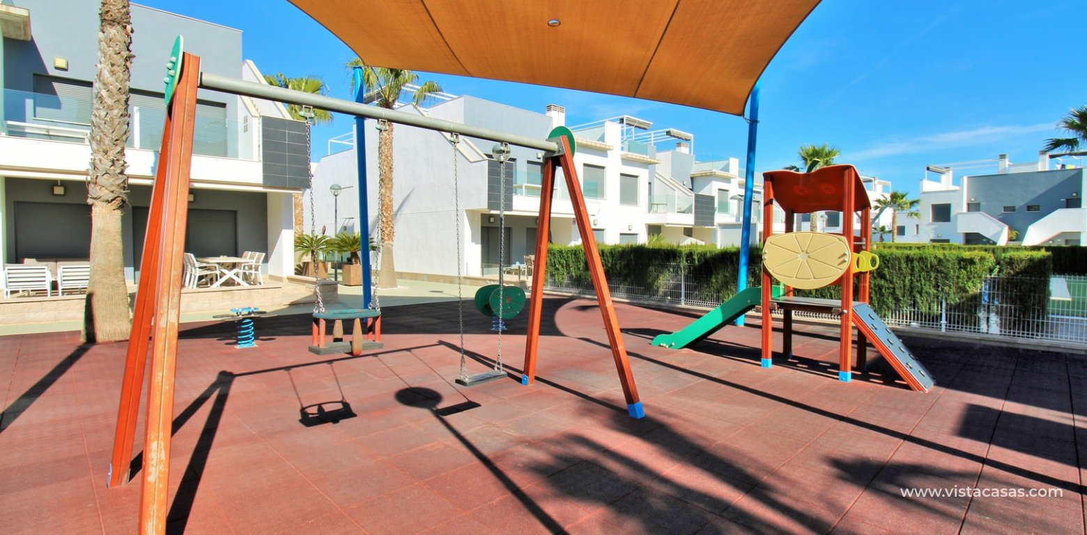 Ground floor apartment for sale in Lamar Resort II Pilar de la Horadada play area