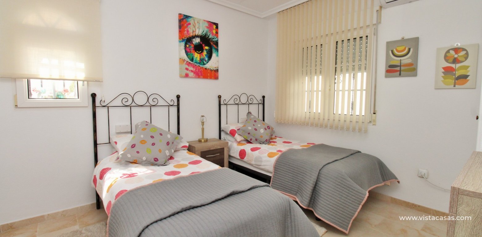 Ibiza style villa for sale R15 Los Dolses Villamartin twin bedroom