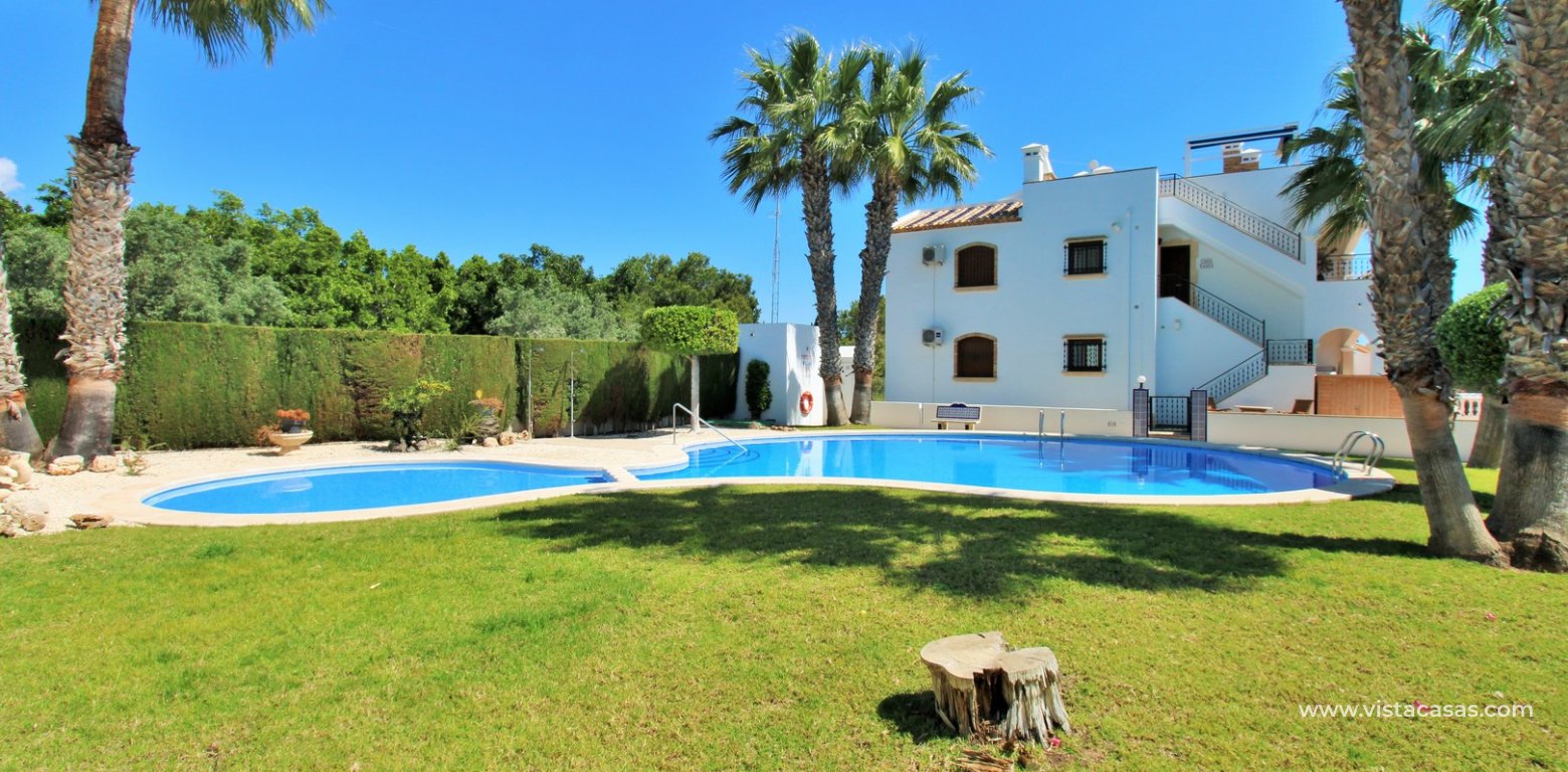 Buhardilla townhouse for sale Pau 8 Villamartin communal pool gardens