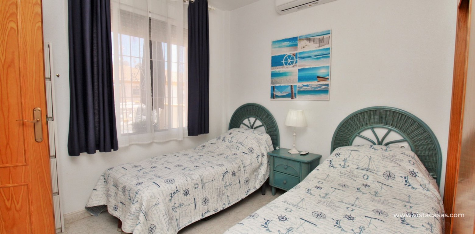 Top floor apartment for sale Sol de Mar Playa Flamenca twin bedroom